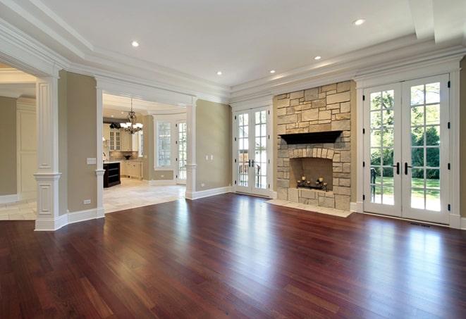 stunning acacia wood floors in a luxurious master bedroom